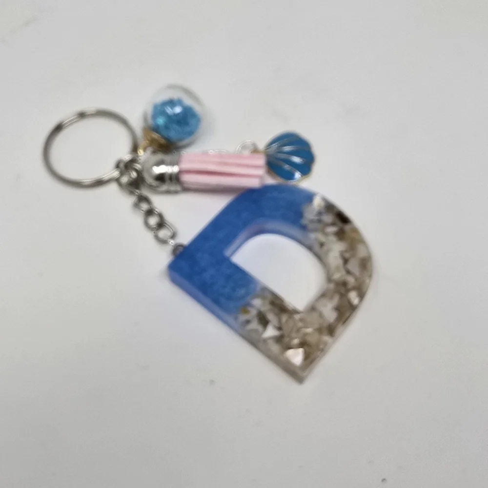 Handmade resin beach themed‎ letter D keychain